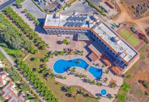 an overhead view of a swimming pool in a resort at Anmaria Beach Hotel & Spa in Ayia Napa