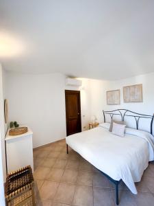 Posteľ alebo postele v izbe v ubytovaní Casa Carmen - Attico vista mare