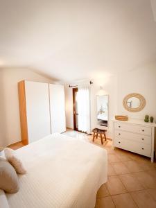 Posteľ alebo postele v izbe v ubytovaní Casa Carmen - Attico vista mare