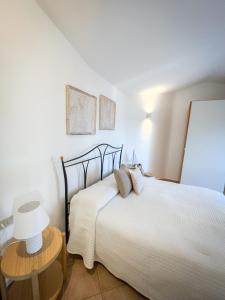 Posteľ alebo postele v izbe v ubytovaní Casa Carmen - Attico vista mare
