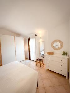 Posteľ alebo postele v izbe v ubytovaní Casa Carmen - Attico vista mare