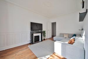 Televízia a/alebo spoločenská miestnosť v ubytovaní Appart 4pers#Mouffetard#Port-Royal#La Sorbonne