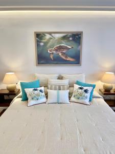 Postel nebo postele na pokoji v ubytování Home2Book El Encanto de La Bahía Santa Cruz + 26 fotografií