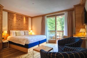 Postel nebo postele na pokoji v ubytování Maribel Hotel