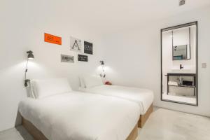 Voodi või voodid majutusasutuse ART'OTEL Ximending TAIPEI toas