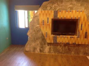 TV a/nebo společenská místnost v ubytování Kenting Sun & Sea B&B