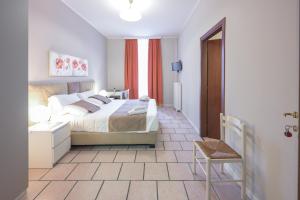 A bed or beds in a room at Affittacamere Berzi