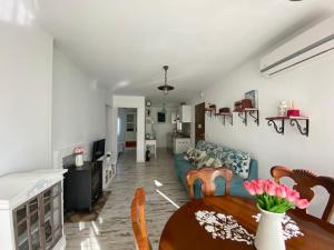 Posezení v ubytování Hermoso Apartamento Vintage + 9 fotografií