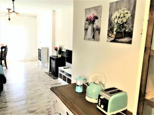 Kuchyň nebo kuchyňský kout v ubytování Hermoso Apartamento Vintage