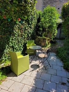 Gîte Milly - 2 studios en coeur de ville外面的花园