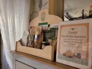 Gîte Milly - 2 studios en coeur de ville的证书、奖牌、标识或其他文件