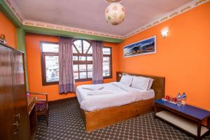 Postel nebo postele na pokoji v ubytování Hotel Pomelo House Inn