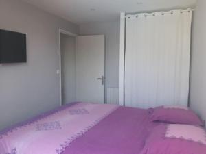 Posteľ alebo postele v izbe v ubytovaní Logement tout neuf avec piscine et bord de mer