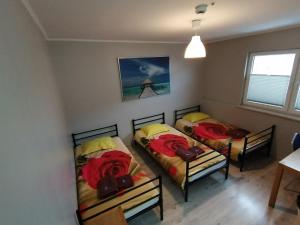 Postel nebo postele na pokoji v ubytování Hostel CENTRUM