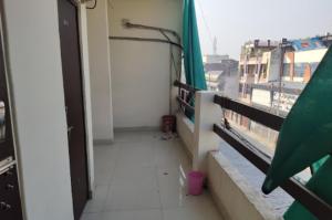 Un balcón o terraza de Kumbh Prayag Guest House By WB Inn