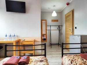 Postel nebo postele na pokoji v ubytování Hostel CENTRUM