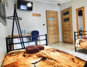 Postel nebo postele na pokoji v ubytování Hostel CENTRUM