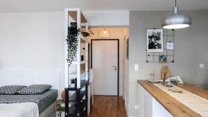 Kuchyň nebo kuchyňský kout v ubytování Cosy apartment