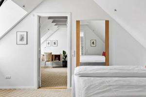 Een bed of bedden in een kamer bij Best Western ToRVEhallerne