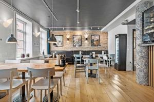 Een restaurant of ander eetgelegenheid bij Best Western ToRVEhallerne