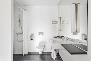 Een badkamer bij Best Western ToRVEhallerne