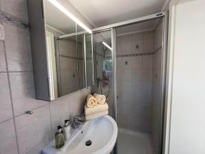 Koupelna v ubytování Kapitän Ahab im Haus Käpt'n Andresen
