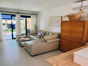 A seating area at Meloneras Garden Suite