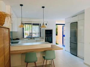 A kitchen or kitchenette at Meloneras Garden Suite
