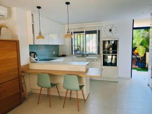 A kitchen or kitchenette at Meloneras Garden Suite