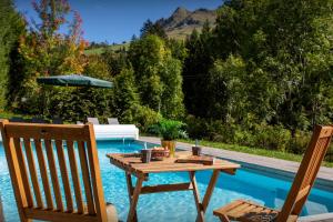 Basen w obiekcie Lodge le Chevreuil - OVO Network lub w pobliżu