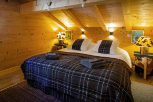 Łóżko lub łóżka w pokoju w obiekcie Lodge le Chevreuil - OVO Network