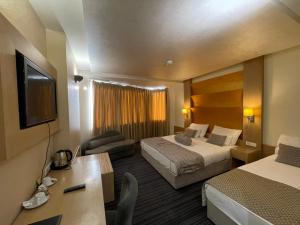 Letto o letti in una camera di Spa Hotel Terme
