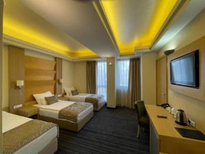 Letto o letti in una camera di Spa Hotel Terme