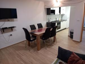 TV a/nebo společenská místnost v ubytování Apartman Purga