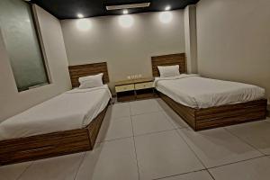 Postel nebo postele na pokoji v ubytování SPAR Serviced Apartments