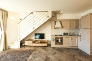Kuchyň nebo kuchyňský kout v ubytování Bellavista Apartments