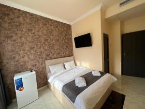 Voodi või voodid majutusasutuse RP HOTEL (NEW) toas