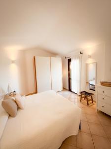 Posteľ alebo postele v izbe v ubytovaní Casa Carmen - Attico vista mare