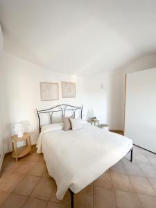 Posteľ alebo postele v izbe v ubytovaní Casa Carmen - Attico vista mare