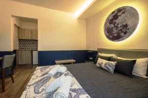 Posteľ alebo postele v izbe v ubytovaní Asteris Village