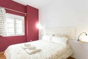 Posteľ alebo postele v izbe v ubytovaní Large Suite Tracatrá Sevilla