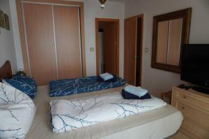 Posteľ alebo postele v izbe v ubytovaní Apartamento del Mar - Fewo am Meer Algarrobo Costa