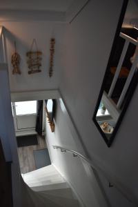 an overhead view of a staircase in a house at ZeeBedStay in Noordwijk aan Zee