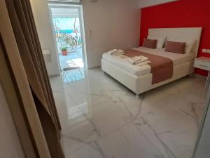 Кровать или кровати в номере House Blerina