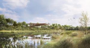 a bridge over a river with birds flying over it at Dorint Kongresshotel Mannheim in Mannheim