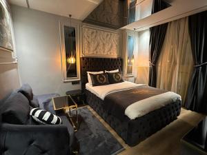 A bed or beds in a room at Wind Suit