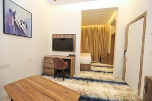 TV o dispositivi per l'intrattenimento presso فندق المدينة القديمة Old Town Hotel