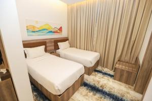 Letto o letti in una camera di فندق المدينة القديمة Old Town Hotel
