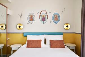 Postel nebo postele na pokoji v ubytování Turtle's Inn Hotel