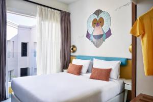 Postel nebo postele na pokoji v ubytování Turtle's Inn Hotel